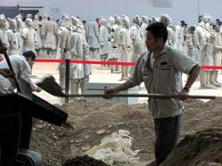 Terra-cotta army is listed among chinese visit-cards. <a href=https://en.wikipedia.org/wiki/Terracotta_Army>Wiki</a> would say more about it. Where else would you find a museum where there's still something to dig?