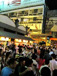Markets grow in size on weekend and even wide streets become difficult to walk through. The majority of buyers are chinese, but foreigners are also welcome. Food, drink, souvenirs and whatever else you need, is here.