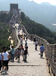 My friend Dong Heng insisted that the Great wall is a mustsee and that without doubts it must be seen in Baadolin. We went there by bus, like most other tourists going to see this wonder of the world. The wall itself is not so high, and it is very populated until you walk far enough from the bus stop. But little by little crowds vanish behind and at some moment you discover yourself tete-a-tete with history. I was standing on the grey bricks and watched the wall winding along green hill slopes. It seemed endless. There was no desire to check its length this time and we turned back. It was time to return home.